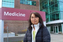 Dr. Michiru Hirasawa, a neurosciences professor at Memorial University, stands in front of the medicine building, the hub of her groundbreaking research on high-fat diets, brain inflammation, and obesity. Cameron Kilfoy • The Telegram