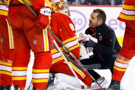'Pretty surreal': Emergency backup goalie Dusty Nickel dresses, nearly plays for Flames