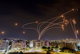 Israel's Iron Dome anti-missile system intercepts rockets launched from the Gaza Strip, as seen from the city of Ashkelon, Israel, October 9, 2023.