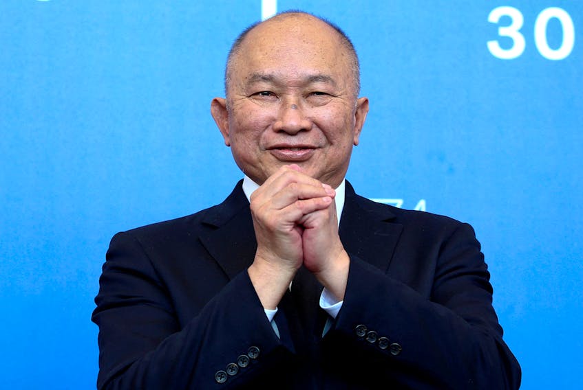 Director John Woo poses during a photocall for the movie "Zhuibu (Manhunt)" at the 74th Venice Film Festival in Venice, Italy September 8, 2017.