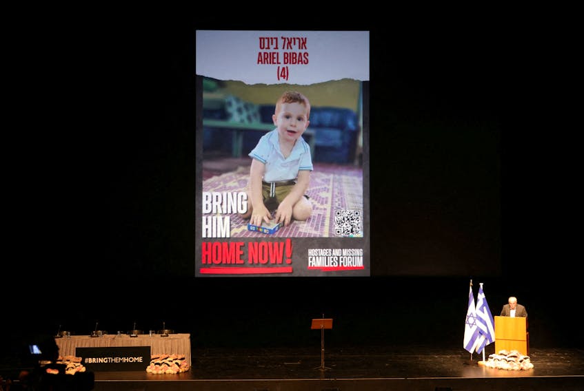 A picture of Ariel Bibas, who was kidnapped by the Palestinian militant group Hamas on October 7, is displayed during an event held at Megaron concert hall by the Israeli community, amid the ongoing conflict between Israel and Hamas, in Athens, Greece, November 5, 2023.
