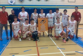 The Charlottetown Rural Raiders won the Wolverine tip-off basketball tournament, hosted by Westisle Composite High School, on Nov. 25. The Raiders defeated the Three Oaks Team One Axemen 79-66 in the championship game. Members of the Raiders are, front row, from left: Michael Galloway, Charlie Hollis, William Ren, Owen Gillespie and Quinn Velasco. Back row: Thomas Docherty (assistant coach), Louis Monaghan (head coach), Ben Holland, Nathan Wheeler, Dillon McEntee, RJ Acorn, Colby Matheson, Jared Harding and Matt Linzel (assistant coach). Photo Courtesy of Brett Corcoran • Special to The Guardian