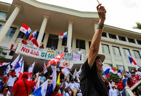 People react after Panama's top court ruled the mining contract with Canadian miner First Quantum to operate a copper mine in the country as unconstitutional following weeks of protests against the deal, in Panama City, Panama November 28, 2023.