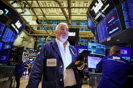 Wall St ends slightly higher after mixed Fed statements