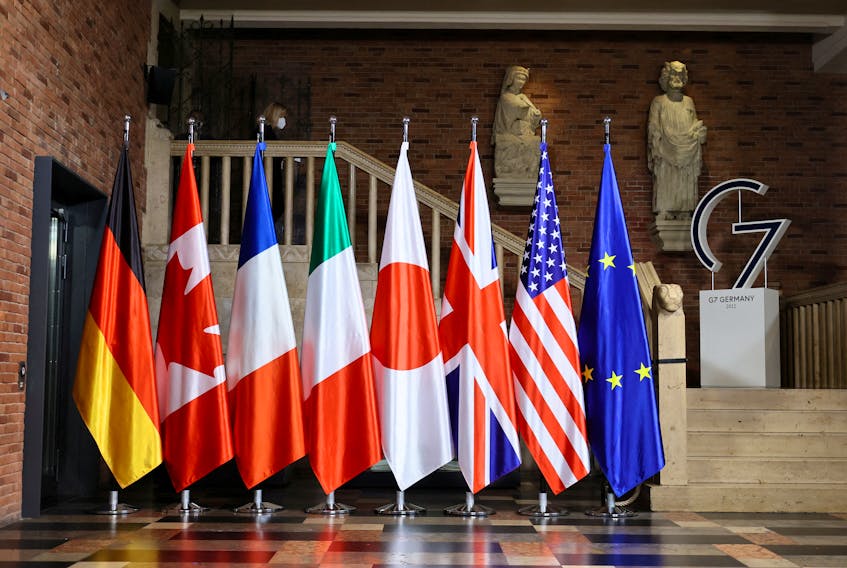 Flags are pictured during the first working session of G-7 foreign ministers in Muenster, Germany, November 3, 2022.