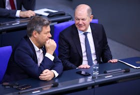 German Economy and Climate Minister Robert Habeck and German Chancellor Olaf Scholz speak on the day of delivering a government declaration on the budget situation to the lower house of parliament Bundestag in Berlin, Germany, November 28, 2023. 