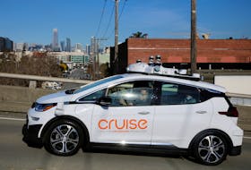 The San Francisco skyline is seen behind a self-driving GM Bolt EV during a media event where Cruise, GM's autonomous car unit, showed off its self-driving cars in San Francisco, California, U.S. November 28, 2017.