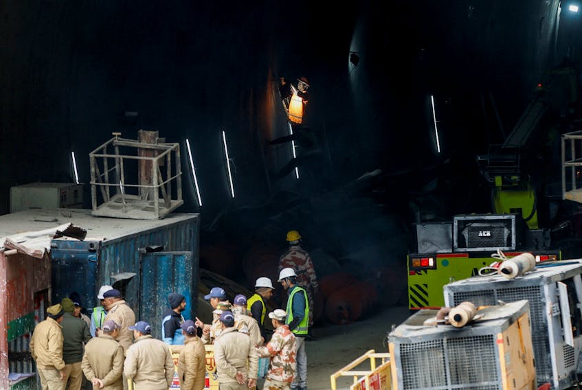A member of the rescue team works as rescue operations continue at a tunnel where workers are trapped, after the tunnel collapsed, in Uttarkashi in the northern state of Uttarakhand, India, November 28, 2023.