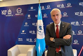 Interpol Secretary General Juergen Stock poses during an interview with Reuters in Vienna, Austria, November 28, 2023.