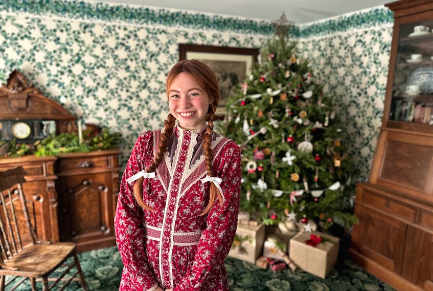 Upon entering Green Gables Heritage Place, visitors are welcomed by Anne Shirley, portrayed by Kate Arbing, who then shares tales of her Christmas celebrations. Thinh Nguyen • The Guardian