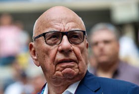 Tennis - US Open - Mens  Final - New York, U.S. - September 10, 2017 - Rupert Murdoch, chairman of Fox Corp, stands before Rafael Nadal of Spain plays against Kevin Anderson of South Africa. 