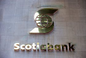 A sign for The Bank of Nova Scotia, operating as Scotiabank, in Toronto, Ontario, Canada December 13, 2021. 
