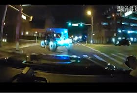 Dashcam footage from the police shows the stolen forklift moving through the city.