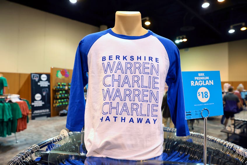 Merchandise featuring the names of Berkshire Hathaway CEO Warren Buffett and Vice Chairman Charlie Munger are displayed for sale during the first in-person annual meeting since 2019 of Berkshire Hathaway Inc in Omaha, Nebraska, U.S. April 30, 2022. 