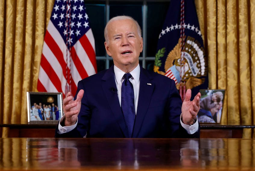 U.S.  President Joe Biden delivers a prime-time address to the nation about his approaches to the conflict between Israel and Hamas, humanitarian assistance in Gaza and continued support for Ukraine in their war with Russia, from the Oval Office of the White House in Washington, U.S. October 19, 2023.