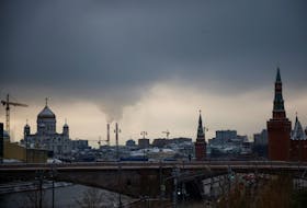 Steam rises from chimneys of a heating power plan over the skyline of central Moscow, Russia November 23, 2020.