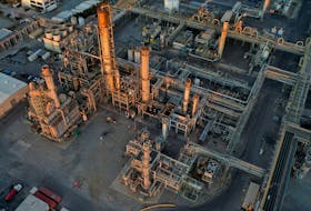 A general view of the Phillips 66 Company's Los Angeles Refinery, which processes domestic & imported crude oil into gasoline, aviation and diesel fuels, at sunset in Carson, California, U.S., March 11, 2022. 