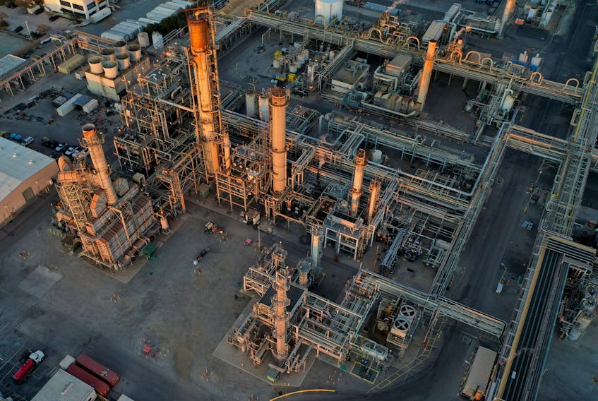 A general view of the Phillips 66 Company's Los Angeles Refinery, which processes domestic & imported crude oil into gasoline, aviation and diesel fuels, at sunset in Carson, California, U.S., March 11, 2022. 