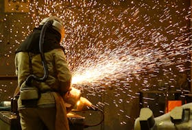 A steel worker grinds a steel cast at ‘Friedrich Wilhelms-Huette (FWH) Stahlguss' steel casting firm in Muelheim an der Ruhr, Germany, April 2, 2022.