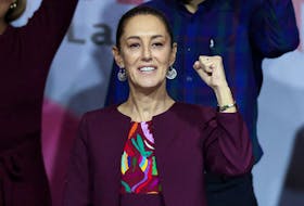 Former Mexico City Mayor and ruling National Regeneration Movement (MORENA) party, candidate Claudia Sheinbaum, gestures during her registration as oficial candidate for MORENA for the 2024 presidential election, in Mexico City, Mexico November 19, 2023.