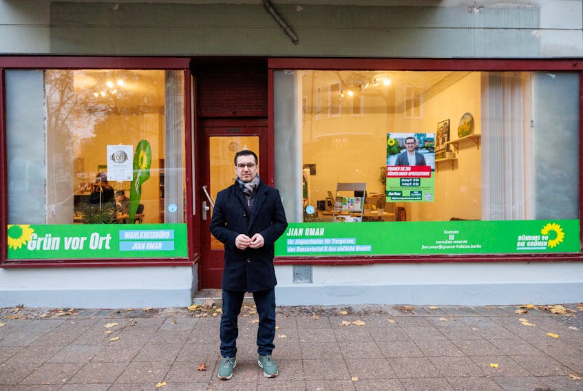 Jian Omar, a German politician of Kurdish-Syrian background, stands in front of his constituency office that has been attacked three times since October 7, amid the ongoing conflict between Israel and the Palestinian Islamist group Hamas, in Berlin, Germany, November 27, 2023.