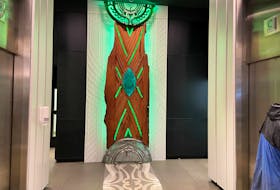 An art installation of Maori forest god Tane Mahuta is seen on display at the lobby of New Zealand's Central Bank building in Wellington, New Zealand September 22, 2021. Picture taken September 22, 2021.