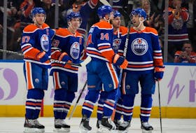 The Edmonton Oilers celebrate Mattias Janmark's (13) goal against the Vegas Golden Knights on Tuesday, Nov. 28, 2023, in Edmonton. 