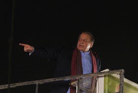 Pakistan's former Prime Minister Nawaz Sharif addresses supporters upon his arrival from a self-imposed exile in London, ahead of the 2024 Pakistani general election, in Lahore, Pakistan October 21, 2023.