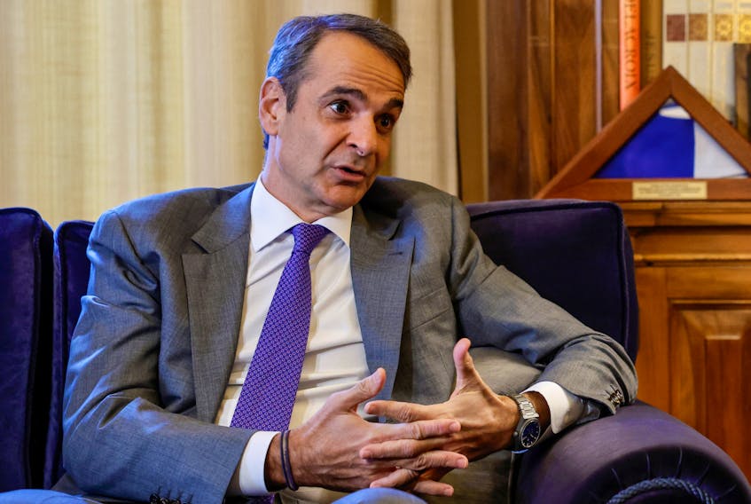 Greek prime minister Kyriakos Mitsotakis talks with Greek president Katerina Sakellaropoulou (not pictured) during their meeting at the presidential palace in Athens, Greece November 29, 2023.