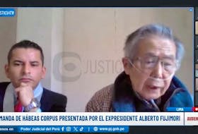 Judge Nestro Paredes listens as former Peruvian President Alberto Fujimori speaks during a digital hearing, in Lima, Peru October 4, 2023, in this screen grab obtained from a video.     Courtesy of Peruvian Justice TV/Handout via REUTERS