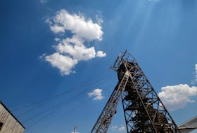 Clouds pass over the pit head at Sibanye Gold's Masimthembe shaft in Westonaria, South Africa, April 3, 2017.