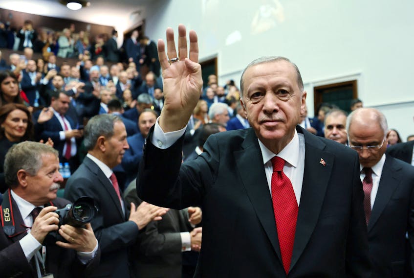 Turkey's President Tayyip Erdogan greets lawmakers of his ruling AK Party during a meeting at the Parliament in Ankara, Turkey November 29, 2023. Murat Cetinmuhurdar/Turkish Presidential Press Office/Handout via REUTERS