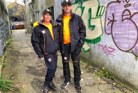 Krista Woodill, left, and Shaun Woodill stand in an alley way off Charlotte Street which was one of the areas they cleaned up of substance use litter on Oct. 29. NICOLE SULLIVAN/CAPE BRETON POST
