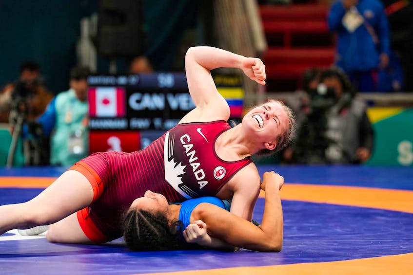 P.E.I.'s Hannah Taylor pins Ecuador's Luisa Valverde in the semifinal match at the Pan American Games in Santiago, Chile. The 25-year-old from Cornwall went to capture silver in the women's 57kg event. (Canadian Olympic Committee photo)