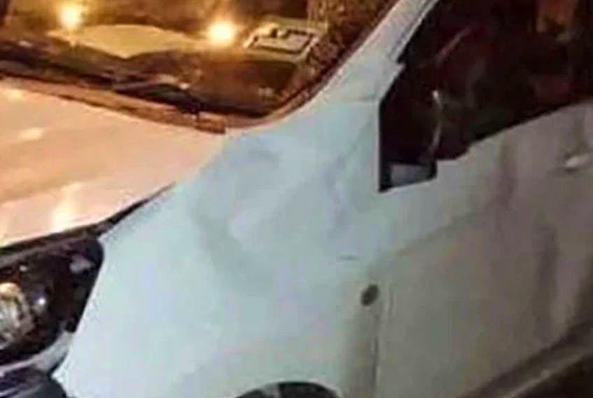 A police image shows the damage to the car after five elephants attacked it.