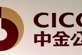 The company logo of China International Capital Corporation Ltd (CICC), China’s first joint venture investment bank, is displayed at a news conference on the company's annual results in Hong Kong, China March 30, 2016.