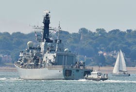 The British Royal Navy frigate HMS Westminster sets sail from Portsmouth Harbour in southern England August 13, 2013. 