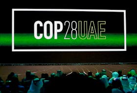 'COP28 UAE' logo is displayed on the screen during the opening ceremony of Abu Dhabi Sustainability Week (ADSW) under the theme of 'United on Climate Action Toward COP28', in Abu Dhabi, UAE, January 16, 2023.