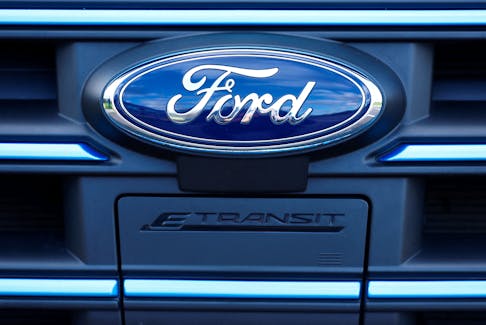 The Ford badge and E-Transit logo are seen on a vehicle at Ford’s Dunton Technical Centre in Dunton, Britain, January 13, 2023. 