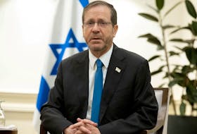 Israel's President Isaac Herzog attends a meeting with the U.S. Secretary of State (not pictured), in Tel Aviv, Israel on November 30, 2023, following the announcement of an extension of the truce between Israel and Hamas just before it was due to expire. SAUL LOEB/Pool via