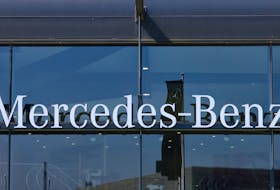 The logo of Mercedes-Benz is seen outside a Mercedes-Benz car dealer in Brussels, Belgium June 1, 2023.