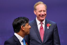 Britain's Prime Minister Rishi Sunak and Microsoft President Brad Smith attend the AI Safety Summit in Bletchley Park, near Milton Keynes, Britain, November 2, 2023.
