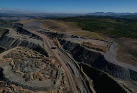 The edge of Glencore's Mount Owen coal mine and adjacent rehabilitated land are pictured in Ravensworth, Australia, June 21, 2022. Picture taken with a drone. 