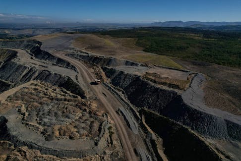 The edge of Glencore's Mount Owen coal mine and adjacent rehabilitated land are pictured in Ravensworth, Australia, June 21, 2022. Picture taken with a drone. 