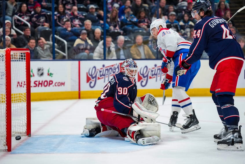 Nov 29, 2023; Columbus, Ohio, USA;  Columbus Blue Jackets goaltender Elvis Merzlikins (90) reacts after Montreal Canadiens right wing Joel Armia (40) deflects the puck for a goal in the third period at Nationwide Arena. Mandatory Credit: Aaron Doster-USA TODAY Sports