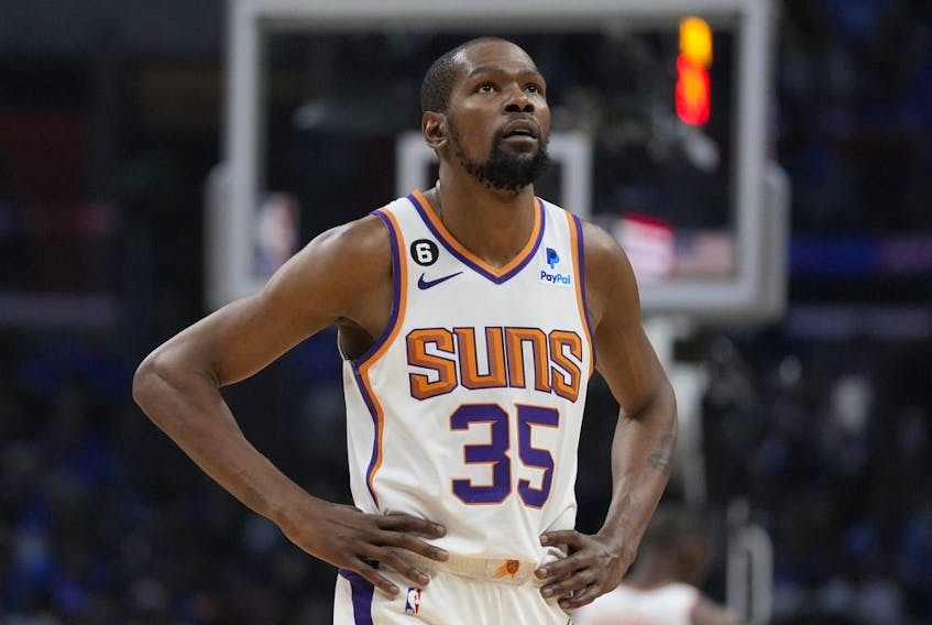 Phoenix Suns forward Kevin Durant walks on the court.
