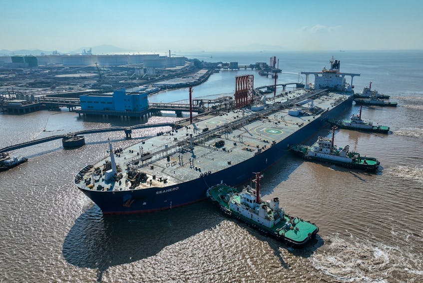 An aerial view shows a crude oil tanker at an oil terminal off Waidiao island in Zhoushan, Zhejiang province, China January 4, 2023. China Daily via