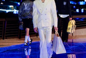 A model presents a creation by designer Pharrell Williams' Men's Pre-Fall 2024 Fashion Show for fashion house Louis Vuitton, in Hong Kong, China November 30, 2023. 