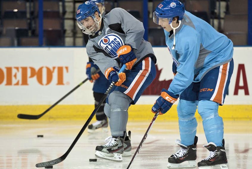 Edmonton Oilers forwards Sam Gagner (89) and Ryan Nugent-Hopkins (93) take part in practice at Rexall Place in Edmonton in this file photo taken on Nov. 14, 2013.