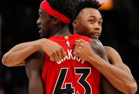 Toronto Raptors forward Pascal Siakam (43) and forward Scottie Barnes (4) celebrate a basket against the Philadelphia 76ers during second half NBA basketball action in Toronto on Wednesday, October 26, 2022. THE CANADIAN PRESS/Frank Gunn